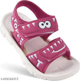 Pink kids sandals with monster teeth design, featuring a zipper on the back and straps around the ankles