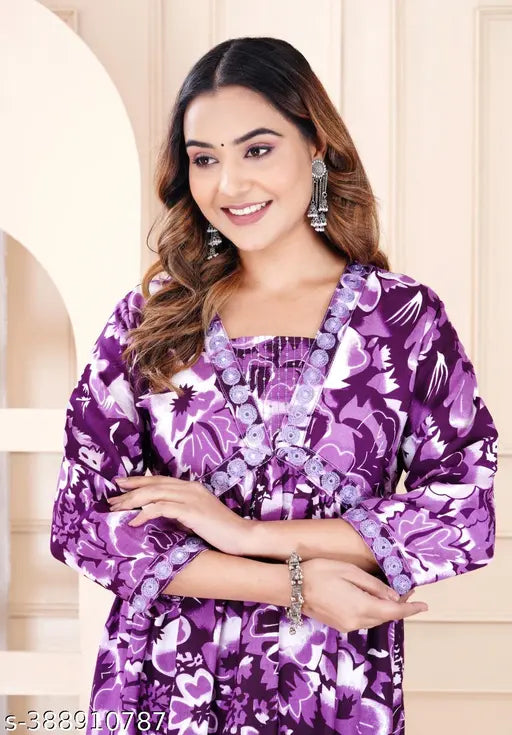 Purple floral print sari with paisley design