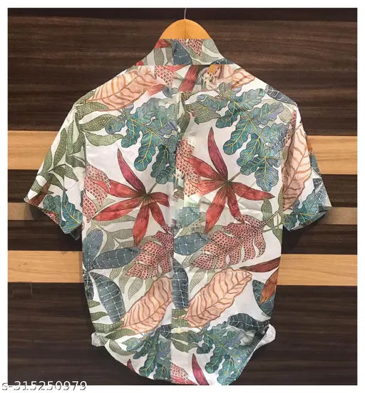 Polycotton Goa-style men's shirt, half sleeve, Cuban collar, digital print. Comfortable and versatile for beachwear or parties." (124 characters)