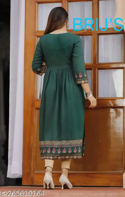 Green and white traditional kurta with Ganmesh border, long sleeves, hem length