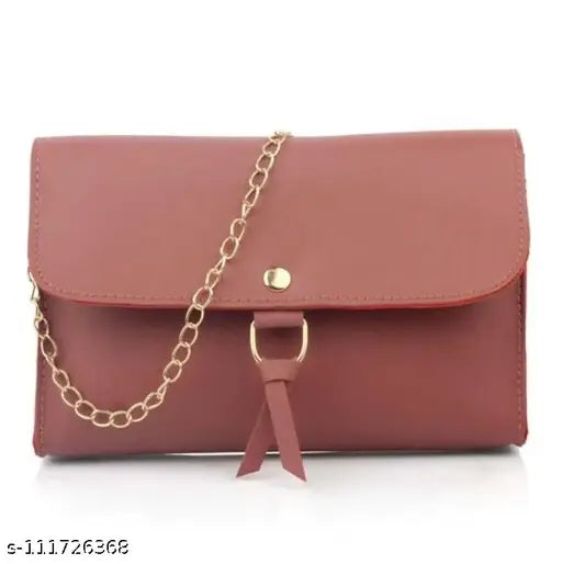 A dark red cross-body handbag with a chain strap