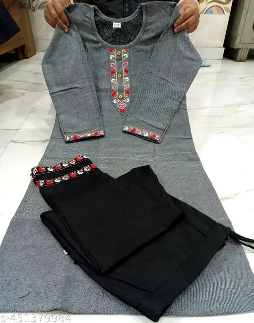 Woolen kurta set with matching trousers, black and gold trim