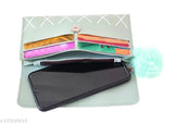 A sling clutch purse with a mirror finish and a card slot