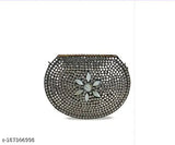 Silver filigree clutch with floral accents, metallic finish