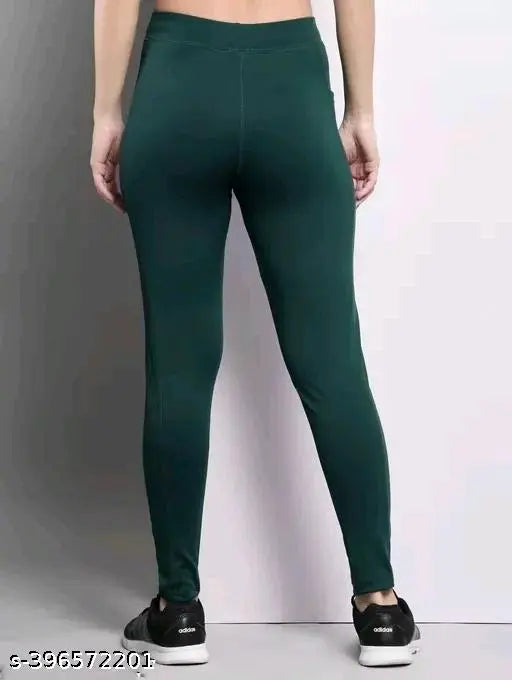 Bottle green and Wain solid polyester spandex gym leggings for women's workout, fitness, yoga, dance, or casual activity. One side pocket with skin-fit elastic