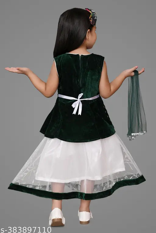 Baby velvet & net embellished lehenga choli set, traditionally Indian three-piece garment including long skirt, sleeveless crop top, & scarf. Available in sizes: 2-3Y (waist 24in, length 19in), 3-4Y (waist 26in, length 22in), etc., up to 9-10Y