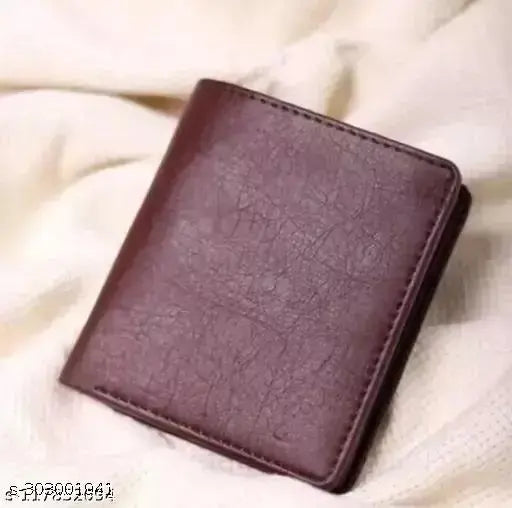 Brown faux leather men's wallet, 6 card slots, 1 coin pocket, 2 hidden compartments, 2 currency slots, 1 ID slot. Great gift idea for loved ones in attractive packaging