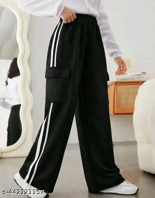 Black pocket cargo trousers with white stripes, wide-leg style.