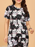 Printed polycotton night suit and dress set for women, featuring short sleeves and a printed net pattern. Available in sizes S-XXL. Made in India