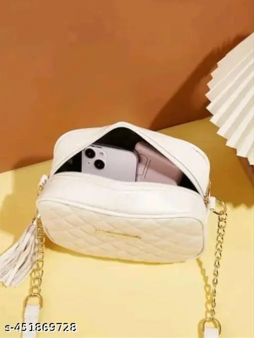 White quilted leather women's slingbag with two pockets