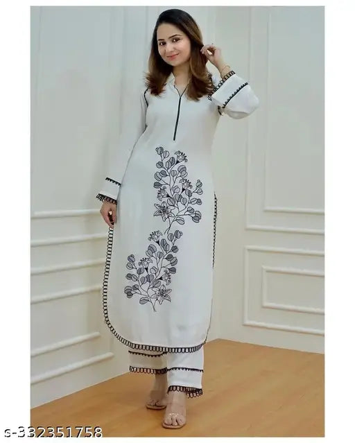 Rayon floral embroidered and printed A-line kurta with rayon pants, three-quarter sleeves, Indian rayon printed design on display
