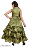 Green full-length party dress with long ruffled sleeves and cinched waist, perfect for girls' party wear. Ethnic gowns in trending solid silk blend for a formal or festive event. Kids wear best quality girls frock