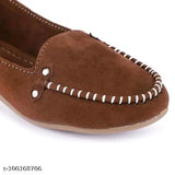 Brown suede loafer shoe with white stitching and button details.