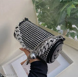 Black studded leather round sling bag, chain handle