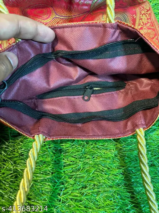 Purple embroidered Banarasi handbag with zip closure