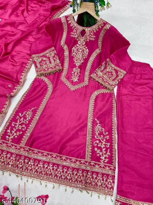 Pink embroidery long anarkali dress with golden details and traditional heavy work