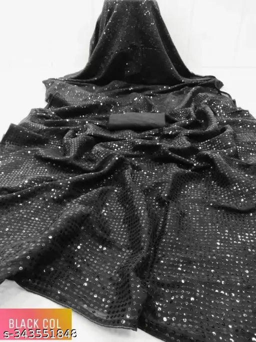 A Georgate sequinned saree with a shiny, starry pattern