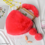 Red faux fur handbag with a heart shape and metal chain strap