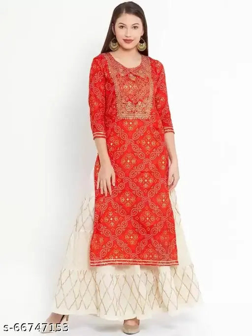 Red and gold embroidered kameez with matching sharara, traditional South Asian clothing for women