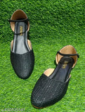 Two black textured leather slip-on sandals with a wedge heel, ideal for casual wear, spring styles, or summer fashion