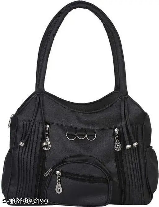 Black purse with fringe and metal accents, zip closure, for women, suitable as a wedding gift or travel bag
