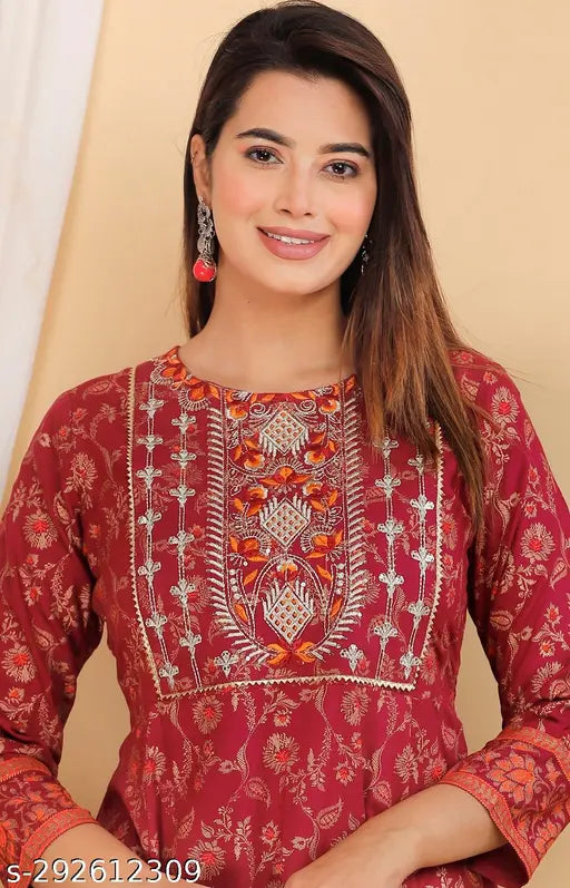 Wine printed rayon Anarkali gown, embroidered kurti with three-quarter sleeves. Rayon kurta for women in A-line calf length style. Red wine dyed floral design, suitable for parties, weddings, and festivals