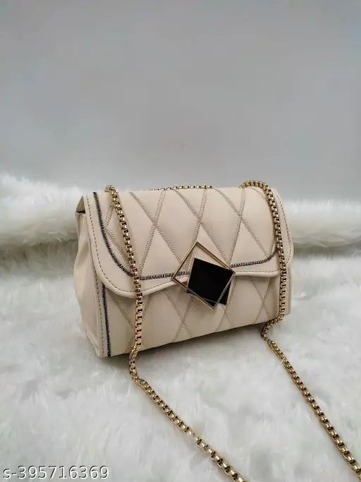 White quilted handbag with multiple pockets and a chain strap