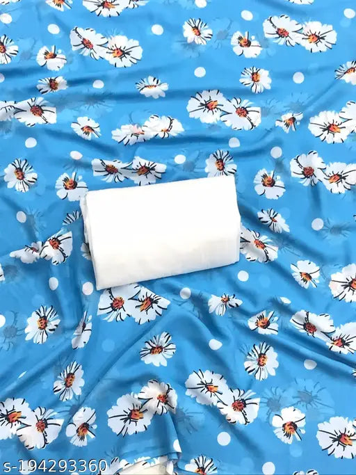 Adrika Fabulous saree with intricate floral patterns, blue background and white dots
