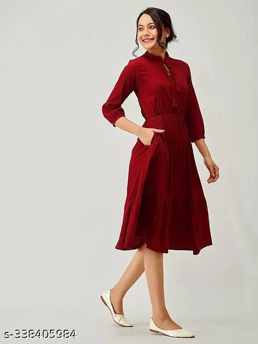 Red rayon straight kurta, round neck with button closure