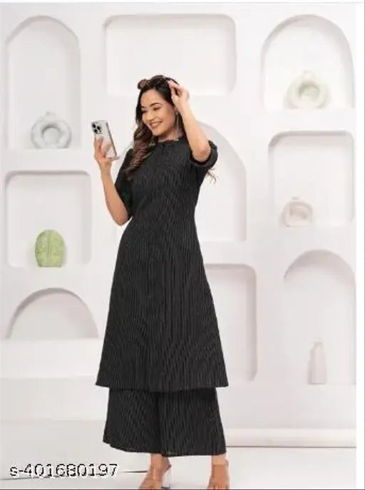 Striped cotton set for women and girls, featuring palazzo bottoms with short sleeves. Single size options available in L, XL, and XXL. Indian-made