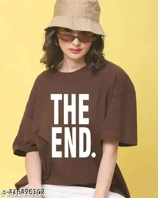 Oversized women's t-shirt with black print featuring the word "THE END