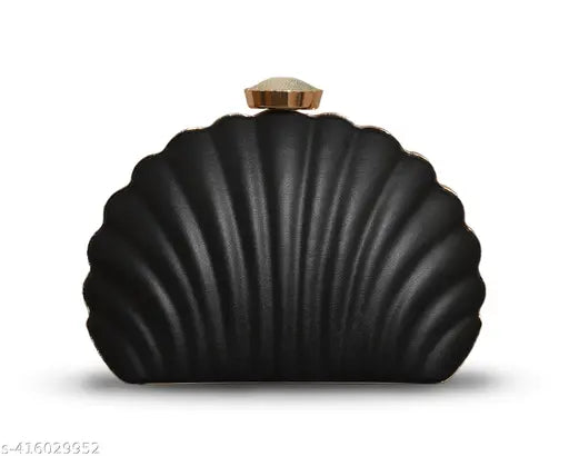 Black leather clutch purse with shiny accents and a bow closure