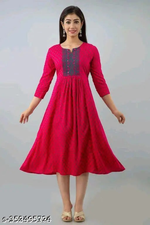 Red cotton long sleeve dress with embroidered neckline