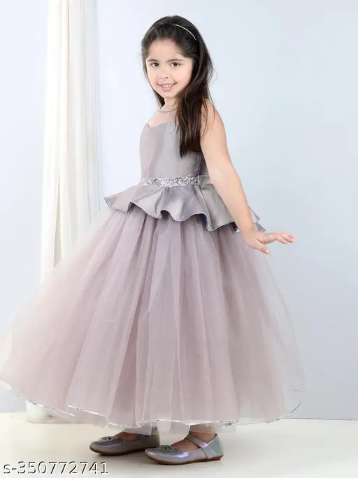Mauve net dress, sleeveless peplum style for kids' parties, Indian origin