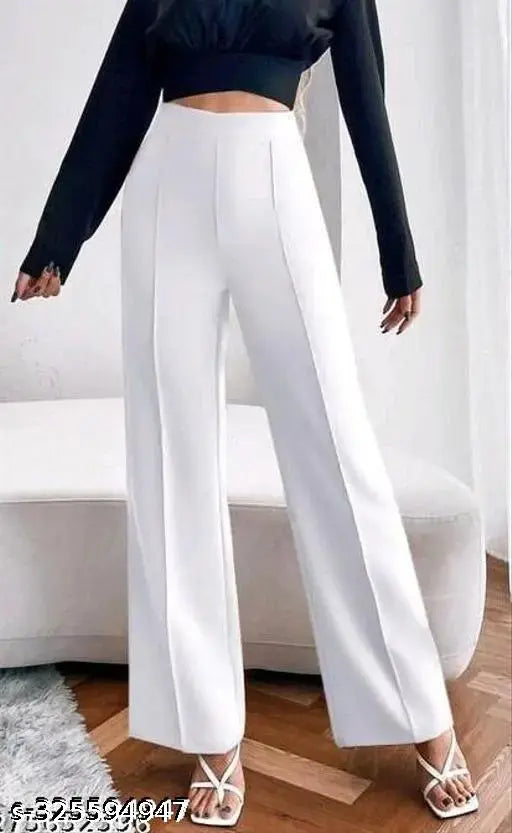 White bell bottom pants with elastic waistband