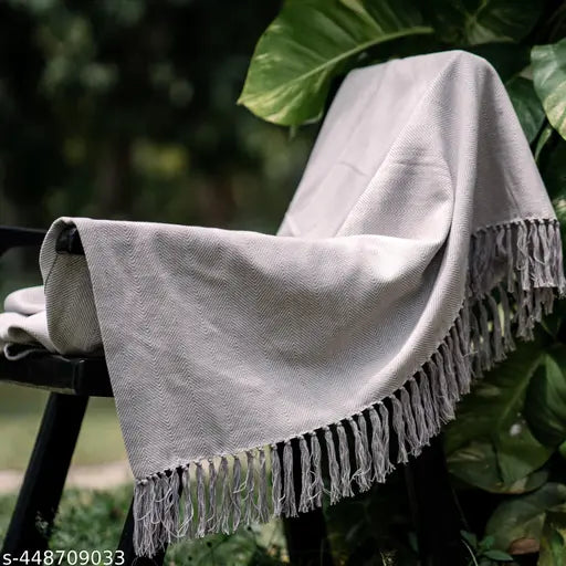 Grey herringbone cotton throw, charming flower border, elegant and reversible