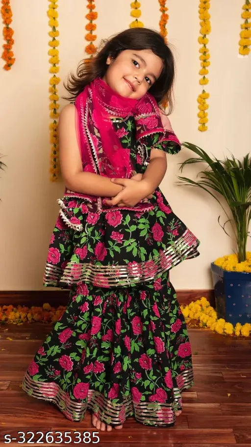 Rayon ethnic wear kurta set with dupatta and bottomwear, printed in vibrant Indian patterns for kids aged 3-8 years, on display rack