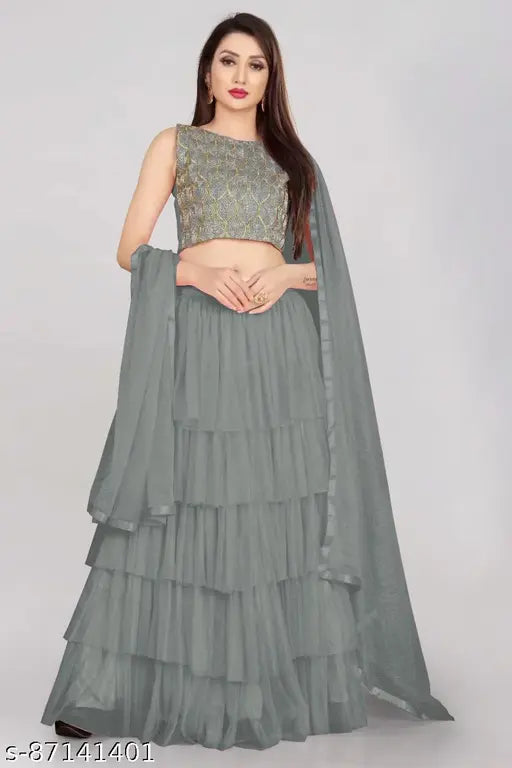 Embroidered satin lehenga top and net dupatta set, ruffle bottomwear with lace detail. Semi-stitched Kashvi refined women's lehenga-choli, alter up to 42 inches, origin India