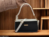 Black faux leather sling bag, adjustable strap, black and white design, 3 pockets