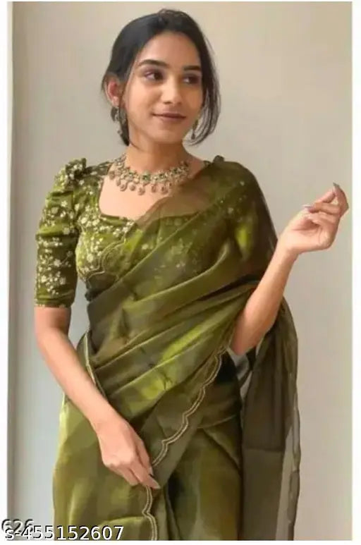Forest green Jimmy-Chho saree with embroidered blouse, organza saree and georgette blouse on fashionable woman