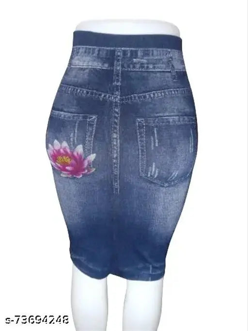 Printed floral cotton blend skater skirt, stretchy and breathable for comfort, hand wash only. Sizes: 28 (28in), 30 (30in), 32 (32in), 34 (34in). Indian-made printed net skirt for women