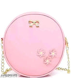 Pink crossbody bag with floral detail