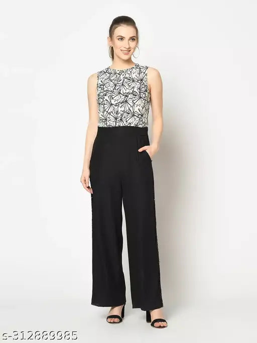 Black & White printed polyester basic jumpsuit with sleeveless design, round neck, and two pockets. Practical fashion for women on-the-go