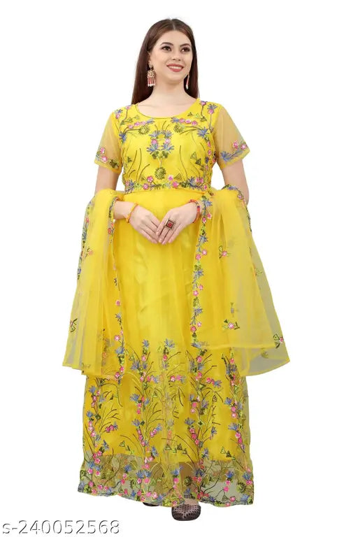 Yellow net embroidered gown with three-quarter sleeves, semi-stitched and includes inner and dupatta. Indian-origin wedding dress on hanger