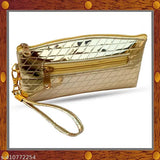 A decorative small clutch bag with a zipper and a long chain strap, often used as an evening or party accessory