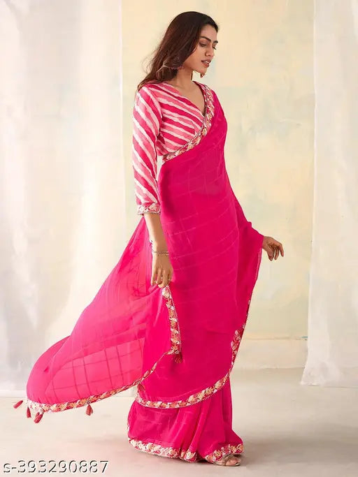 Pink embroidered saree with traditional border, party wear
