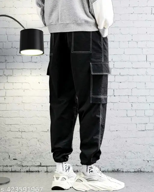 Black Lycra baggy jeans joggers for men, versatile zip cargo style with utility pockets. Men's relaxed-fit, comfortable athletic wear for training or streetwear. Available in sizes: 28, 30, 32, 34 (Waist Size: 28 in, Length Size: 39 in, Hip Size: 38 in). Made in India