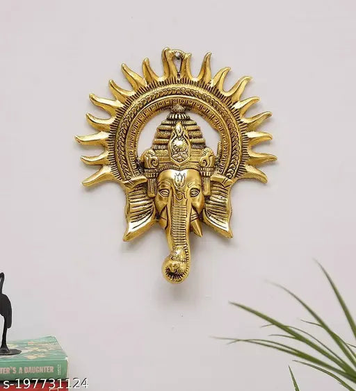 Golden metal Ganesha statue for wall decor, Lucky Feng Shui showpiece figurine, Indian-crafted design
