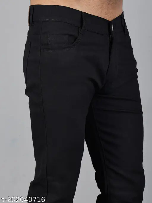 Black polycotton stretchable men's slim mid-rise jeans, ideal for casual, party, and office wear. Comfortable fit, breathable fabric, anti-corrosive buttons, and zip fly closure. Best quality for daily activities and varied sizing from 28 to 32 inches. Made in India