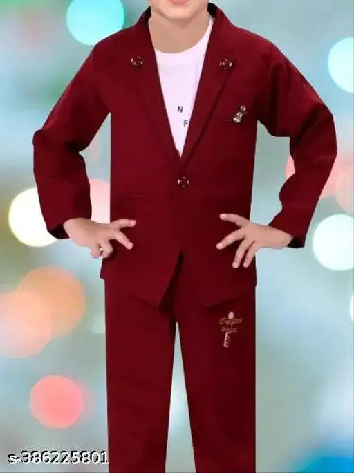 Three-piece red boys' suit set with brown pants, white shirt, and navy jacket